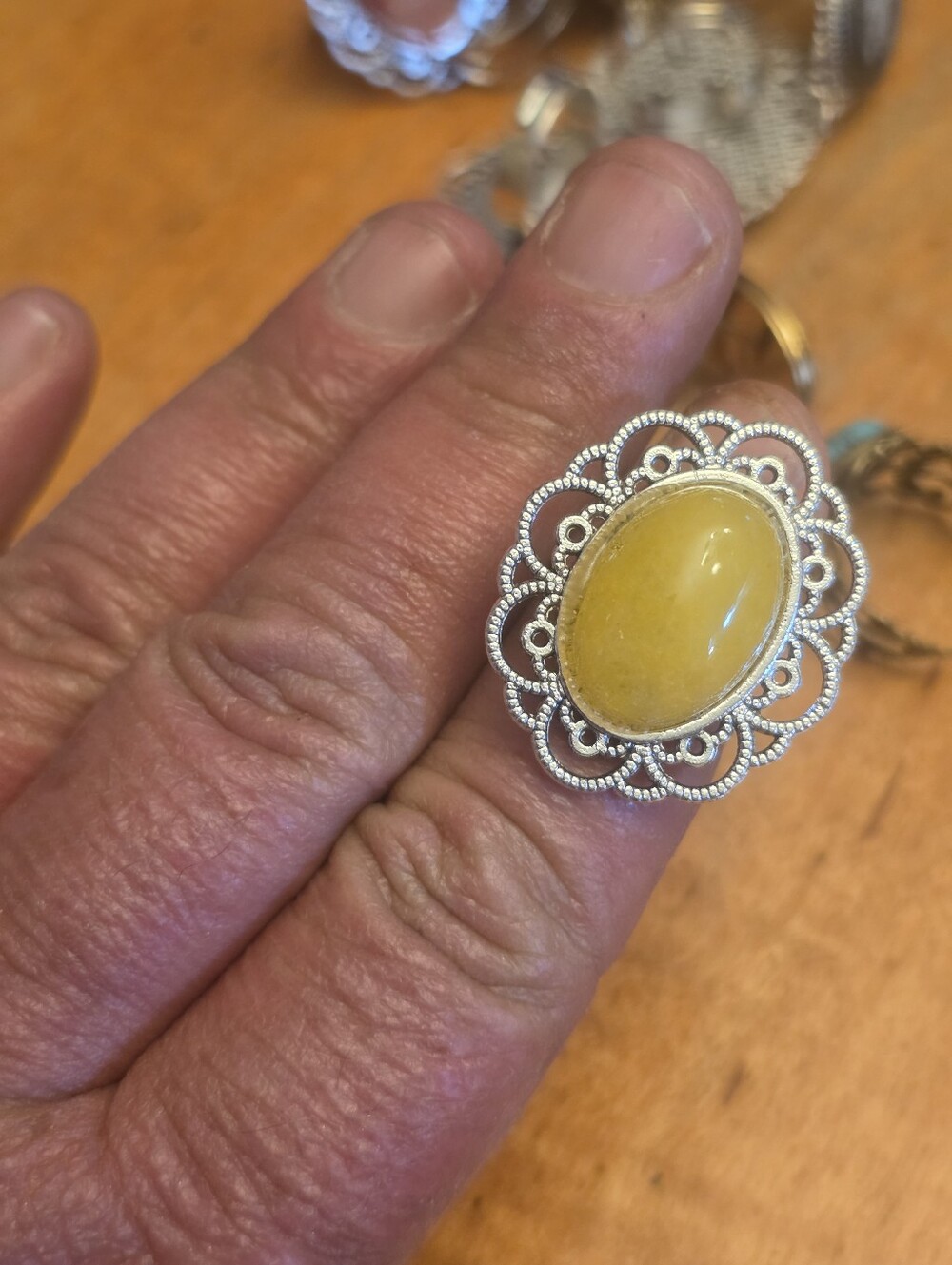 Statement ring featuring a smooth yellow stone In Silver Tone Bezel, Adjustable